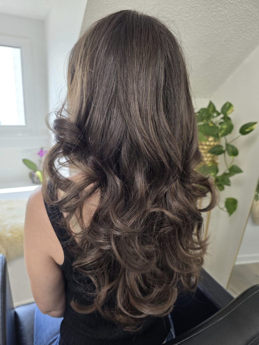 Dark brunette with long layered waves