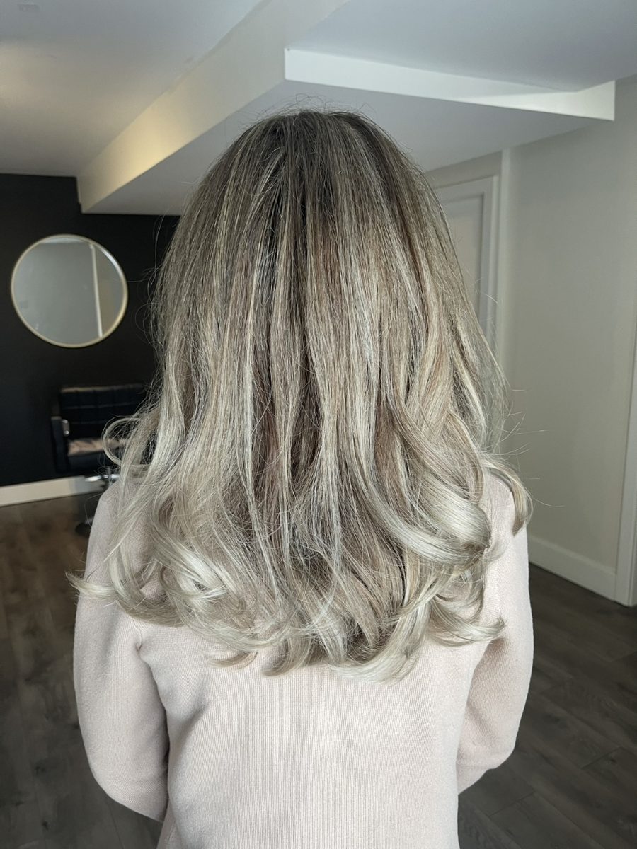 Ash blonde balayage with soft waves