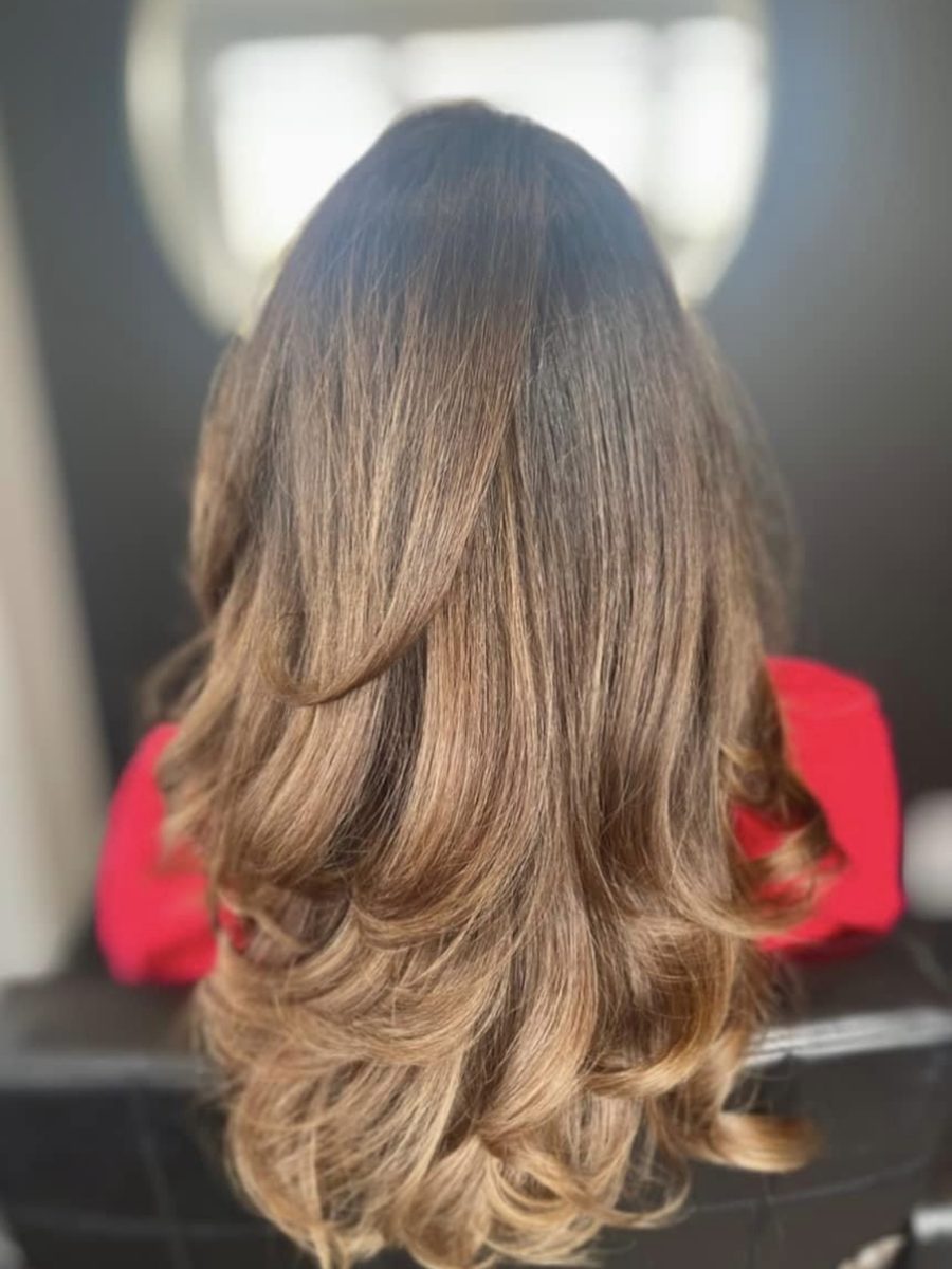 Bronde balayage with soft face-framing layers, back view